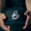 B. Cartier Premium SnapBack (custom available)